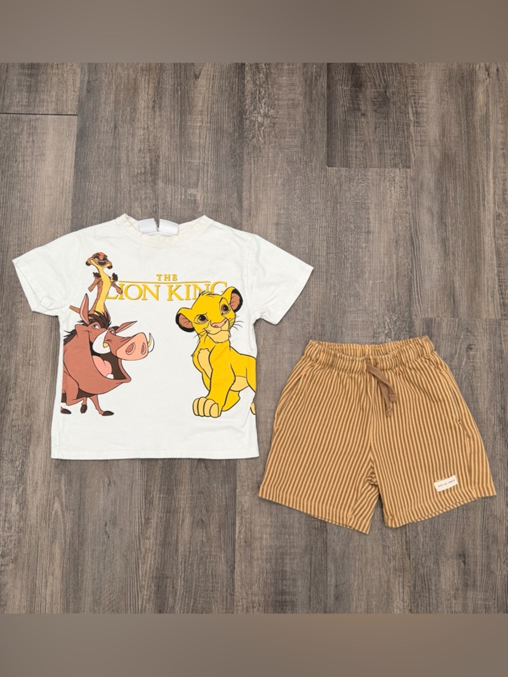 Zara White Tee with Yellow Lion King Graphic and Brown Striped Shorts